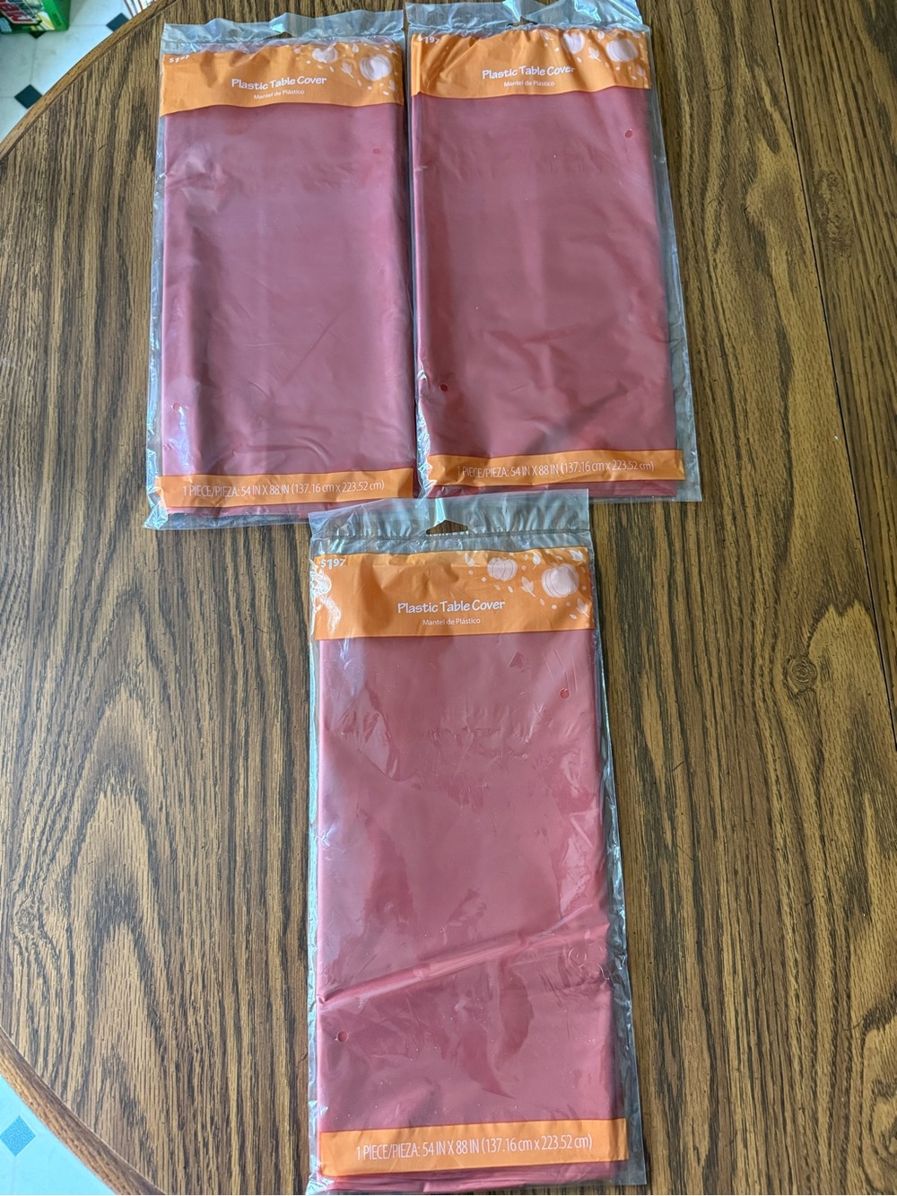 3 rust colored table covers